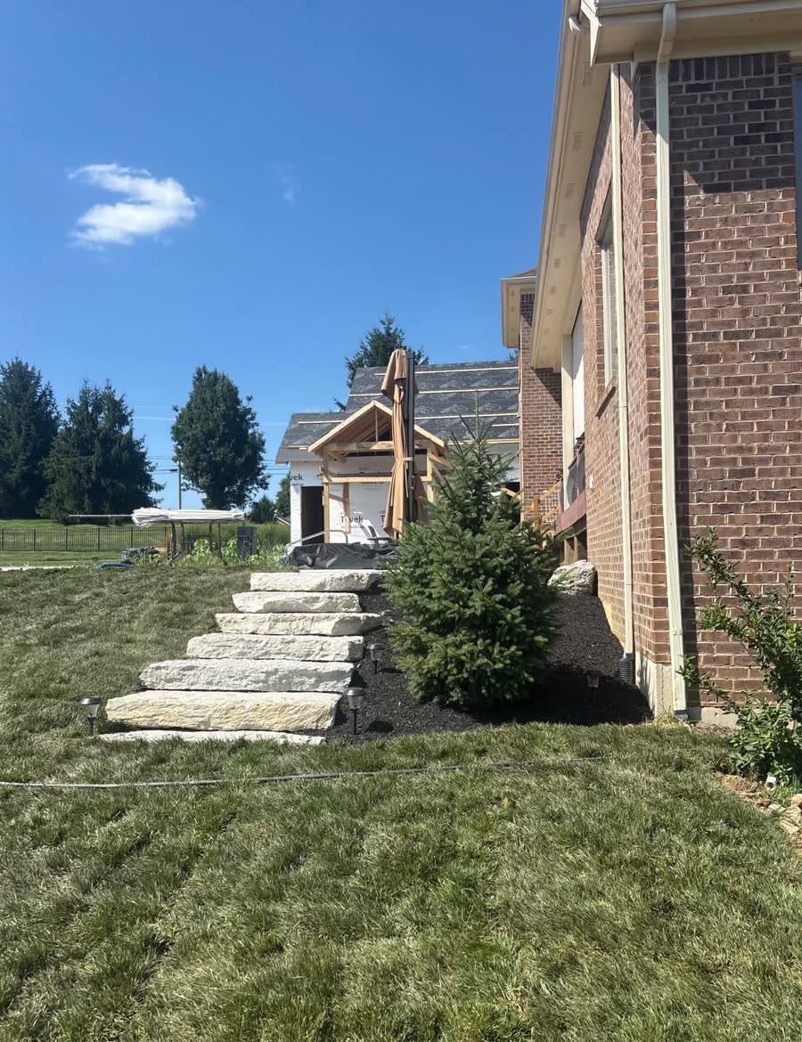 Limestone slab steps with landscape lighting